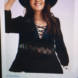 Cute black American Eagle peasant top.